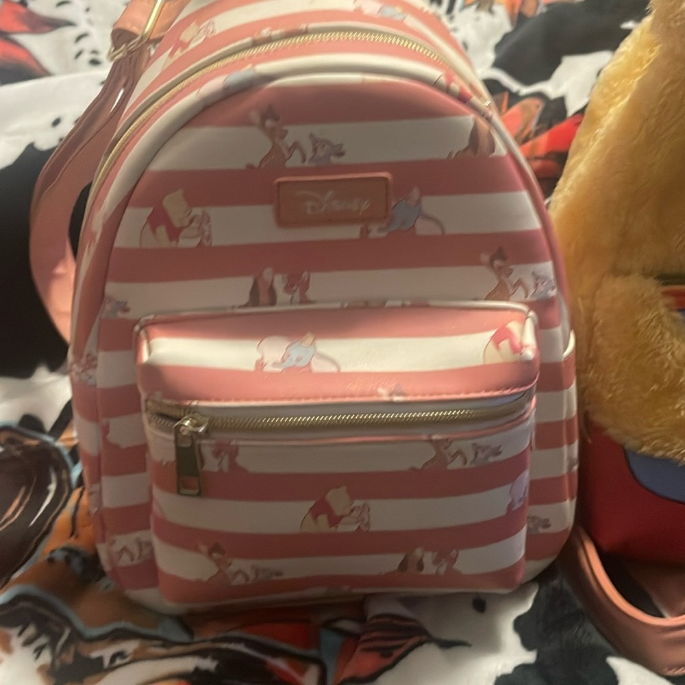 Winne the Pooh hot topic exclusives both included in deal